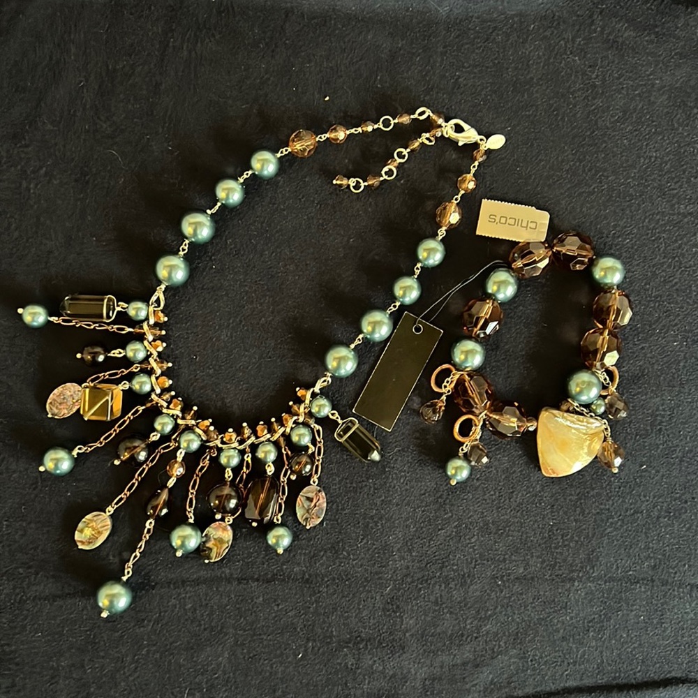 Chico’s charming matching necklace and bracket combo.